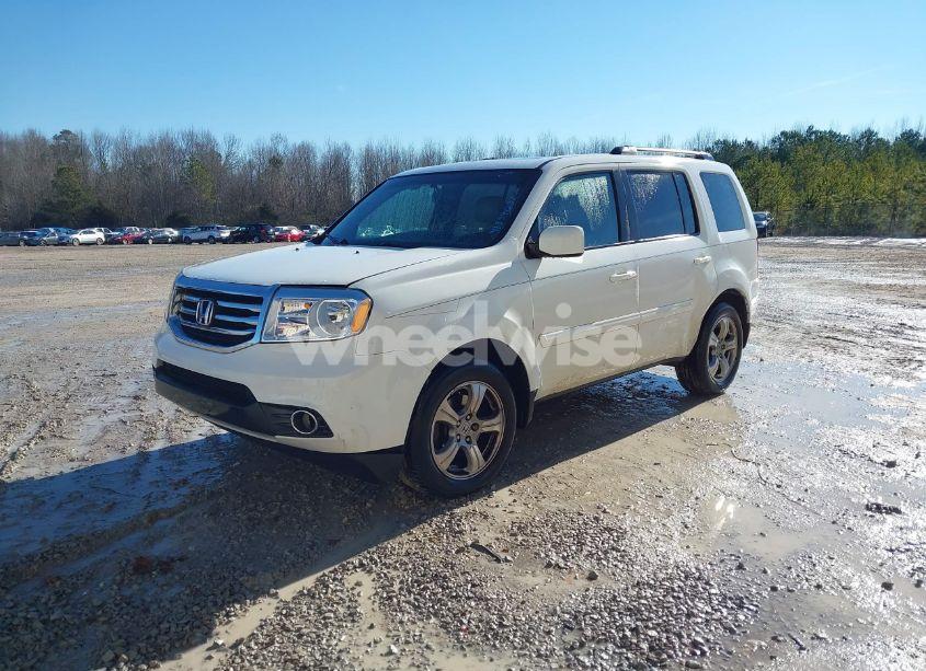 Photo 2 of 2013 Honda Pilot EX-L (VIN 5FNYF3H57DB044331)
