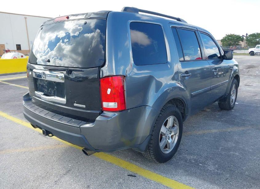 Photo 4 of 2010 Honda Pilot EX-L (VIN 5FNYF3H59AB013948)