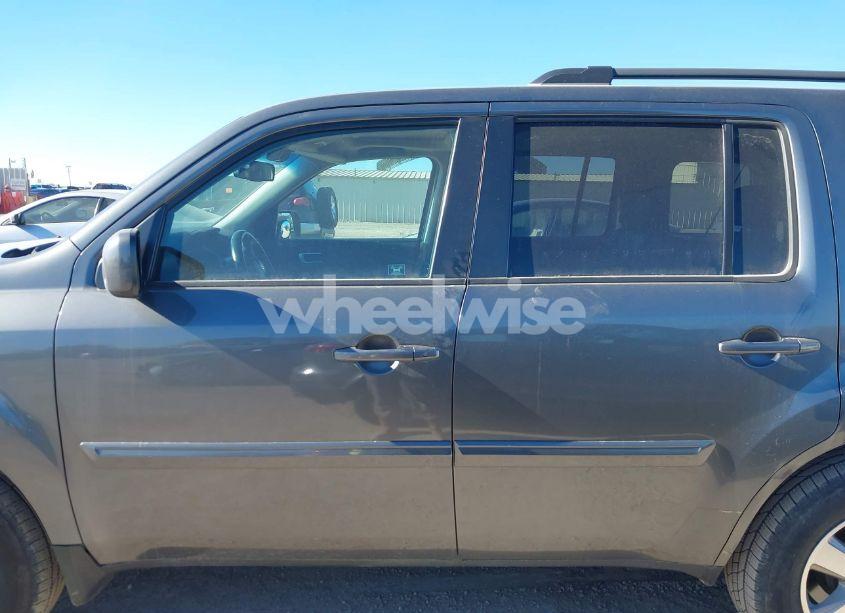 Photo 14 of 2011 Honda Pilot EX-L (VIN 5FNYF3H5XBB040271)