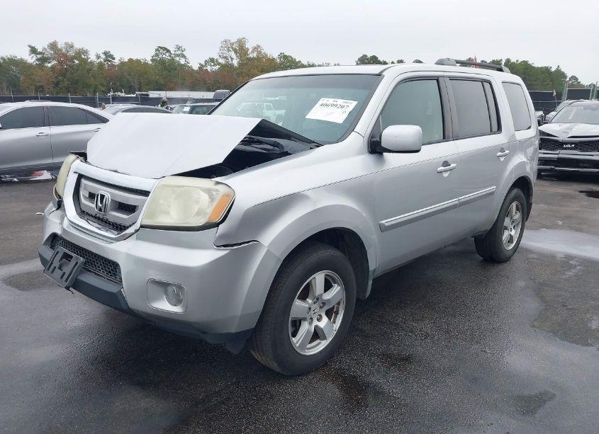 Photo 2 of 2011 Honda Pilot EX-L (VIN 5FNYF3H60BB029627)