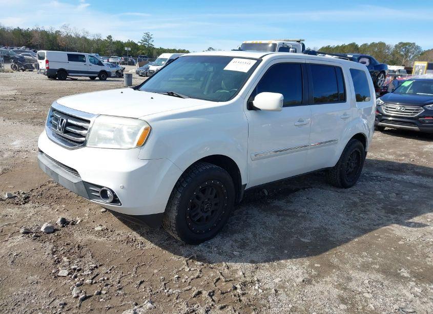 Photo 2 of 2013 Honda Pilot TOURING (VIN 5FNYF3H90DB030631)