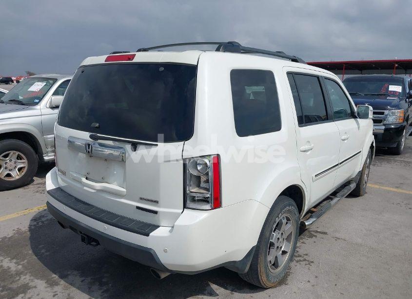 Photo 4 of 2011 Honda Pilot TOURING (VIN 5FNYF3H91BB025693)