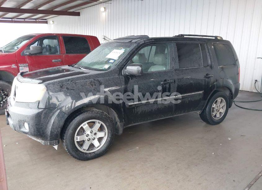 Photo 2 of 2011 Honda Pilot TOURING (VIN 5FNYF3H99BB043956)