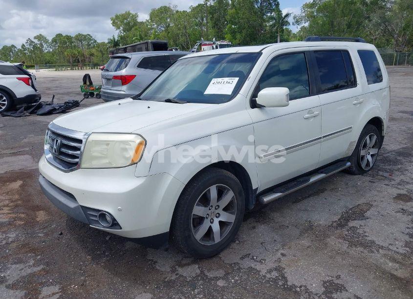 Photo 2 of 2012 Honda Pilot TOURING (VIN 5FNYF3H9XCB035494)
