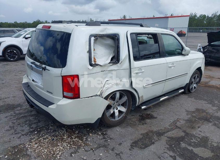 Photo 4 of 2012 Honda Pilot TOURING (VIN 5FNYF3H9XCB035494)