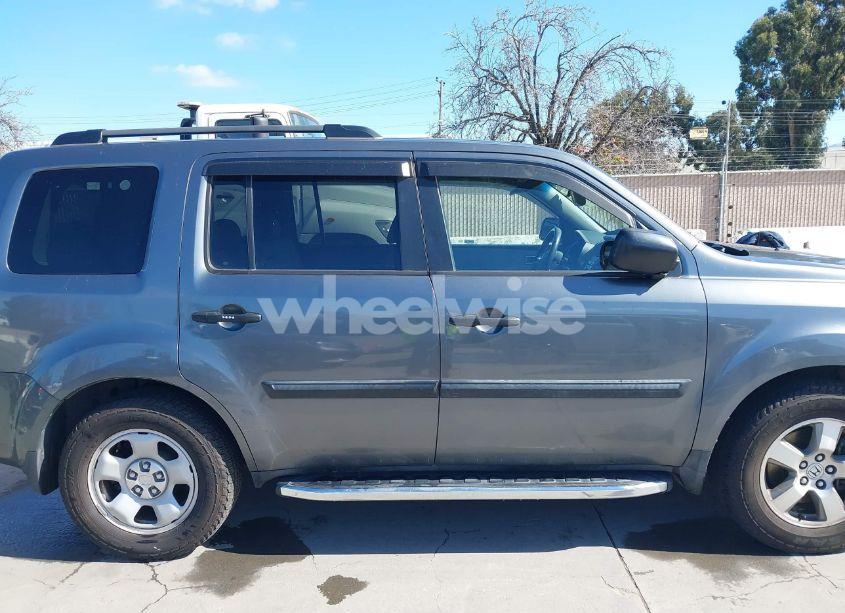 Photo 13 of 2011 Honda Pilot LX (VIN 5FNYF4H20BB028738)