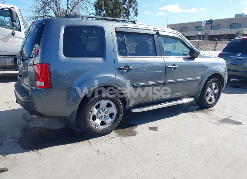 Photo 4 of 2011 Honda Pilot LX (VIN 5FNYF4H20BB028738)