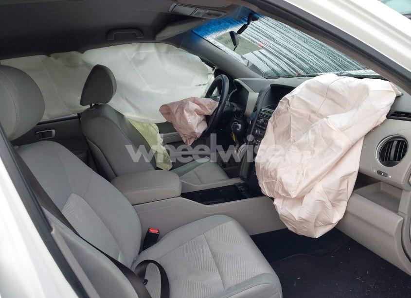 Photo 5 of 2012 Honda Pilot LX (VIN 5FNYF4H21CB007110)