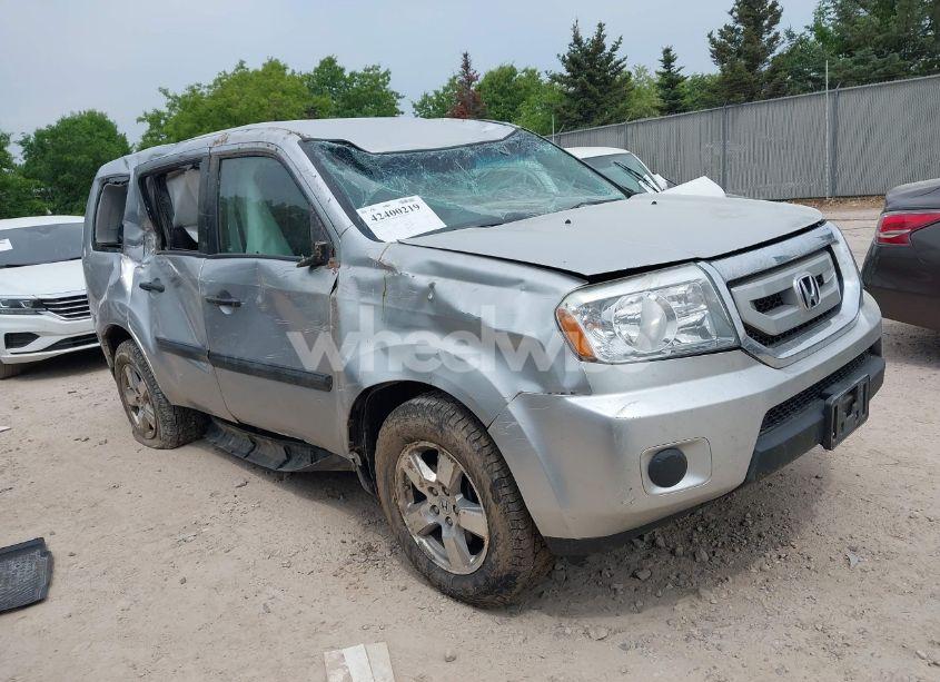 2011 Honda Pilot LX (VIN 5FNYF4H22BB021435) main photo