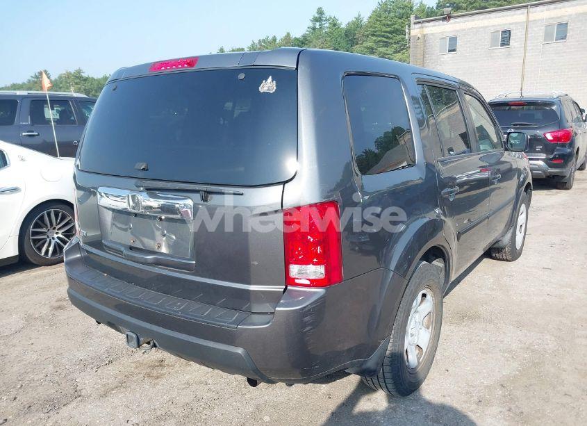 Photo 4 of 2011 Honda Pilot LX (VIN 5FNYF4H27BB003304)