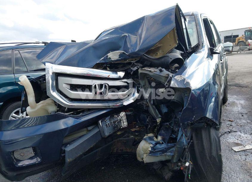 Photo 11 of 2011 Honda Pilot LX (VIN 5FNYF4H27BB097300)