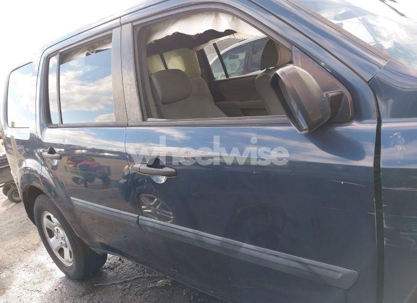 Photo 12 of 2011 Honda Pilot LX (VIN 5FNYF4H27BB097300)