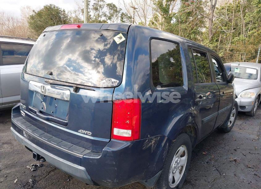 Photo 4 of 2011 Honda Pilot LX (VIN 5FNYF4H27BB097300)