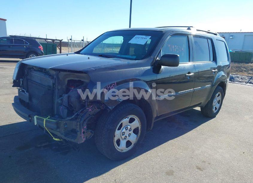 Photo 2 of 2012 Honda Pilot LX (VIN 5FNYF4H27CB083527)