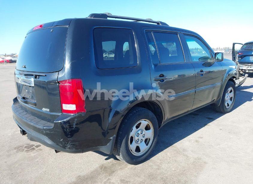 Photo 4 of 2012 Honda Pilot LX (VIN 5FNYF4H27CB083527)