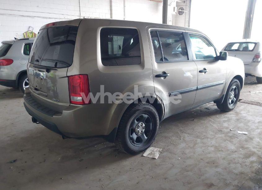 Photo 4 of 2011 Honda Pilot LX (VIN 5FNYF4H29BB061897)