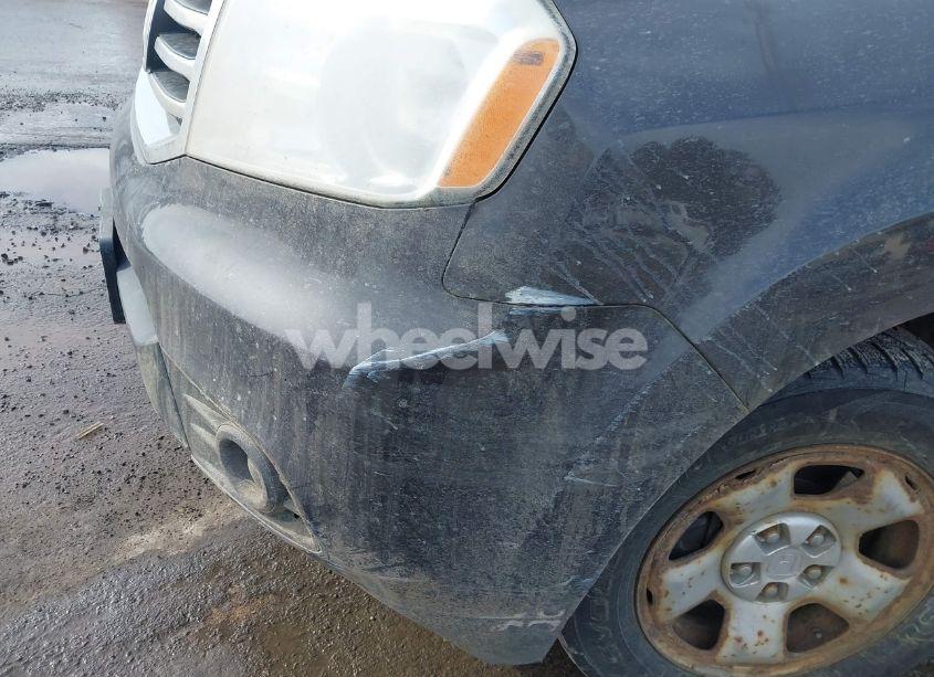 Photo 6 of 2012 Honda Pilot LX (VIN 5FNYF4H29CB005976)