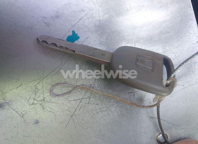 Photo 11 of 2011 Honda Pilot LX (VIN 5FNYF4H2XBB064209)