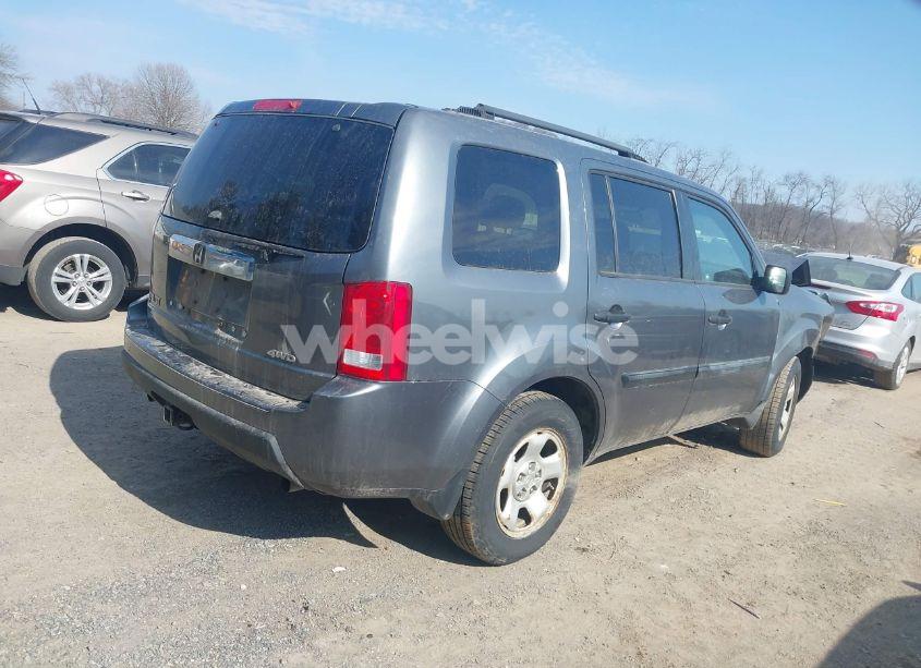 Photo 4 of 2011 Honda Pilot LX (VIN 5FNYF4H2XBB064209)