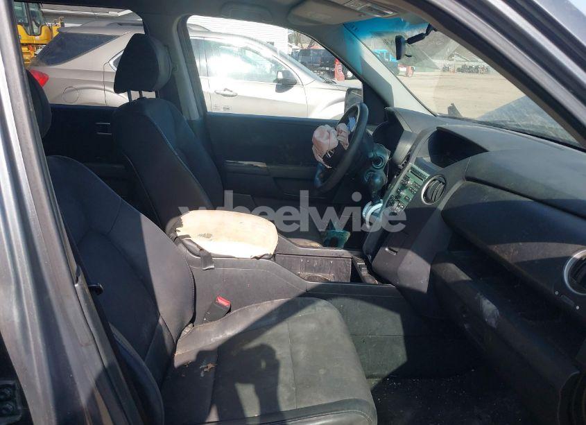 Photo 5 of 2011 Honda Pilot LX (VIN 5FNYF4H2XBB064209)