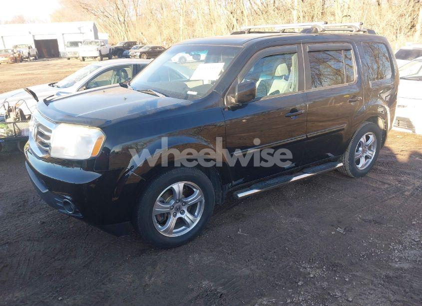 Photo 2 of 2012 Honda Pilot EX (VIN 5FNYF4H42CB009000)