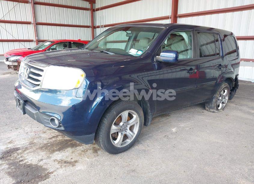 Photo 2 of 2012 Honda Pilot EX (VIN 5FNYF4H42CB009658)