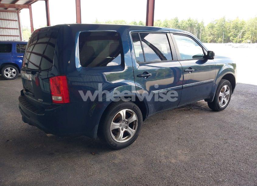 Photo 4 of 2012 Honda Pilot EX (VIN 5FNYF4H42CB009658)