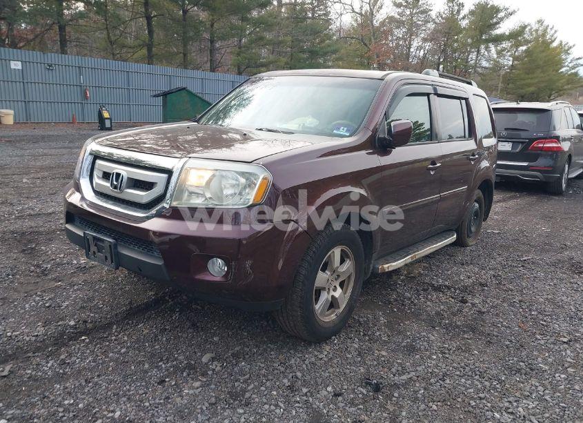 Photo 2 of 2011 Honda Pilot EX (VIN 5FNYF4H43BB064876)