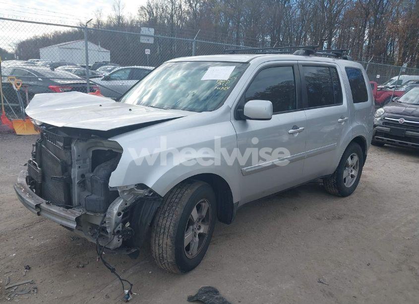 Photo 2 of 2011 Honda Pilot EX (VIN 5FNYF4H44BB079757)