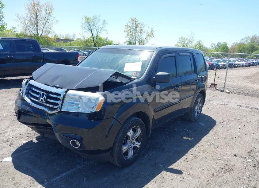 Photo 2 of 2012 Honda Pilot EX (VIN 5FNYF4H45CB006236)