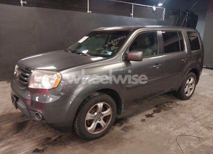 Photo 2 of 2012 Honda Pilot EX (VIN 5FNYF4H47CB023555)