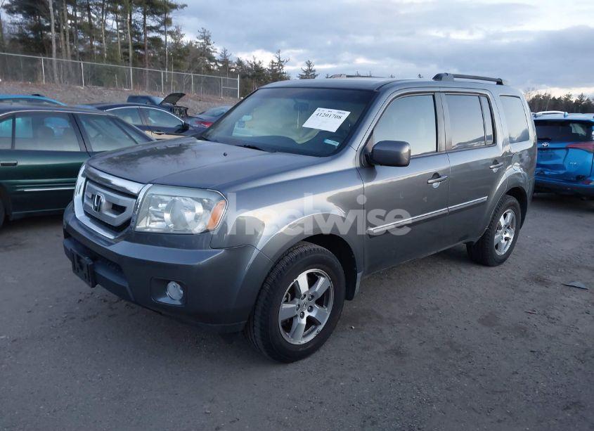 Photo 2 of 2010 Honda Pilot EX (VIN 5FNYF4H4XAB012594)