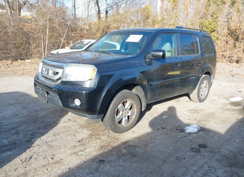 Photo 2 of 2011 Honda Pilot EX (VIN 5FNYF4H4XBB105553)