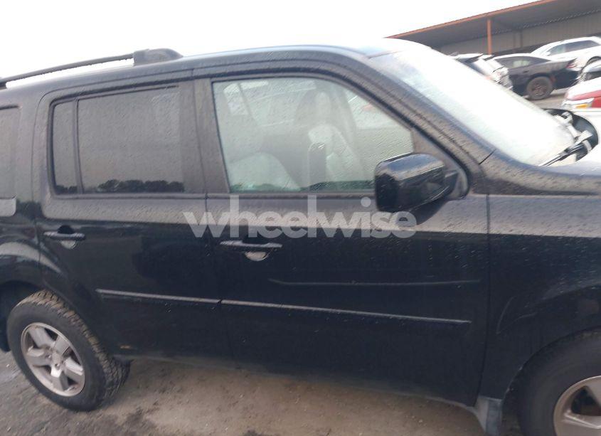 Photo 13 of 2011 Honda Pilot EX-L (VIN 5FNYF4H50BB062544)