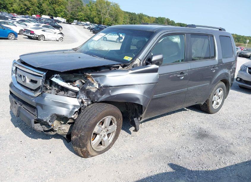 Photo 2 of 2011 Honda Pilot EX-L (VIN 5FNYF4H50BB066352)