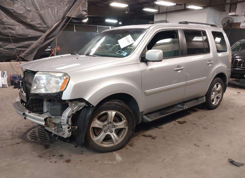 Photo 2 of 2012 Honda Pilot EX-L (VIN 5FNYF4H50CB042120)