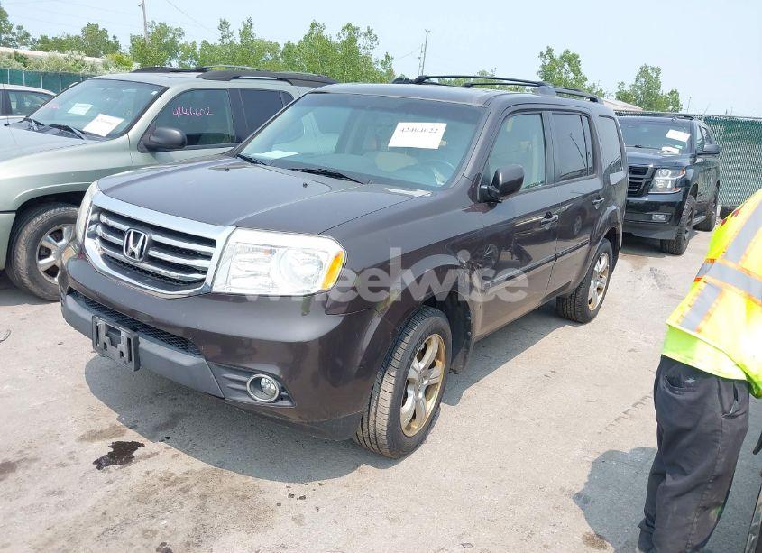 Photo 2 of 2012 Honda Pilot EX-L (VIN 5FNYF4H50CB080933)