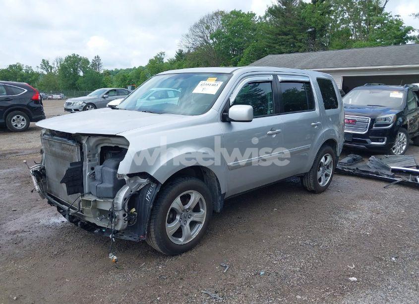 Photo 2 of 2012 Honda Pilot EX-L (VIN 5FNYF4H51CB043504)