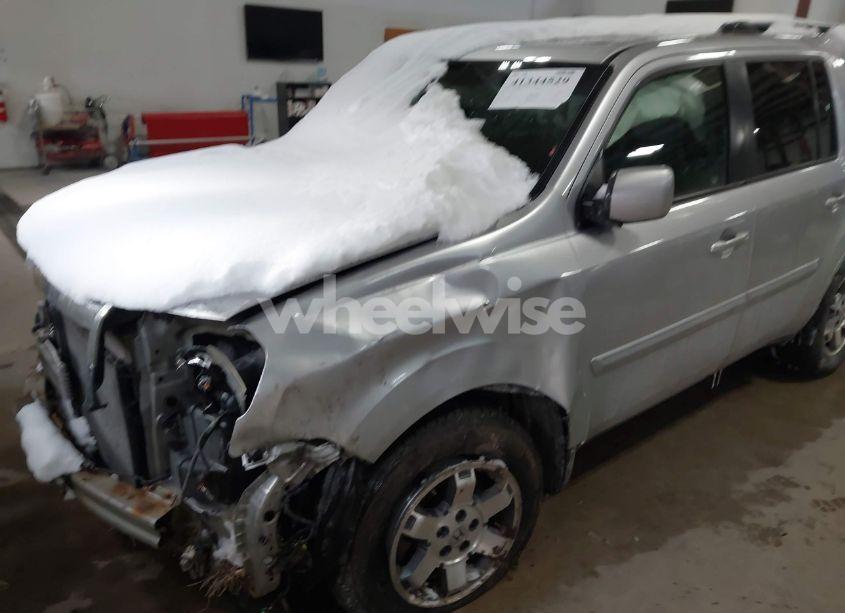 Photo 2 of 2011 Honda Pilot EX-L (VIN 5FNYF4H53BB501364)