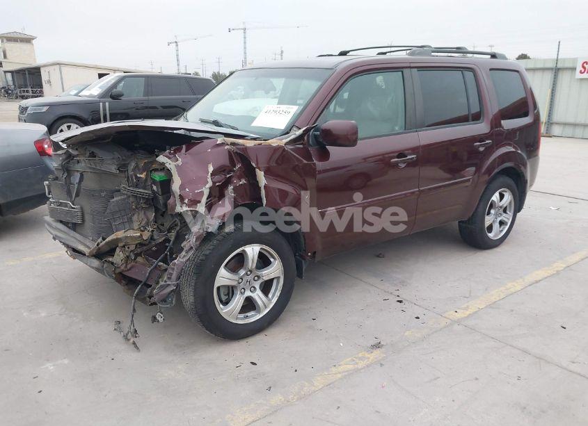 Photo 2 of 2012 Honda Pilot EX-L (VIN 5FNYF4H54CB016121)