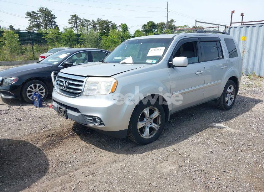 Photo 2 of 2012 Honda Pilot EX-L (VIN 5FNYF4H55CB051671)
