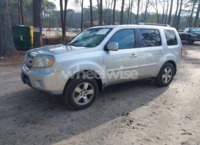 Photo 2 of 2011 Honda Pilot EX-L (VIN 5FNYF4H56BB057851)