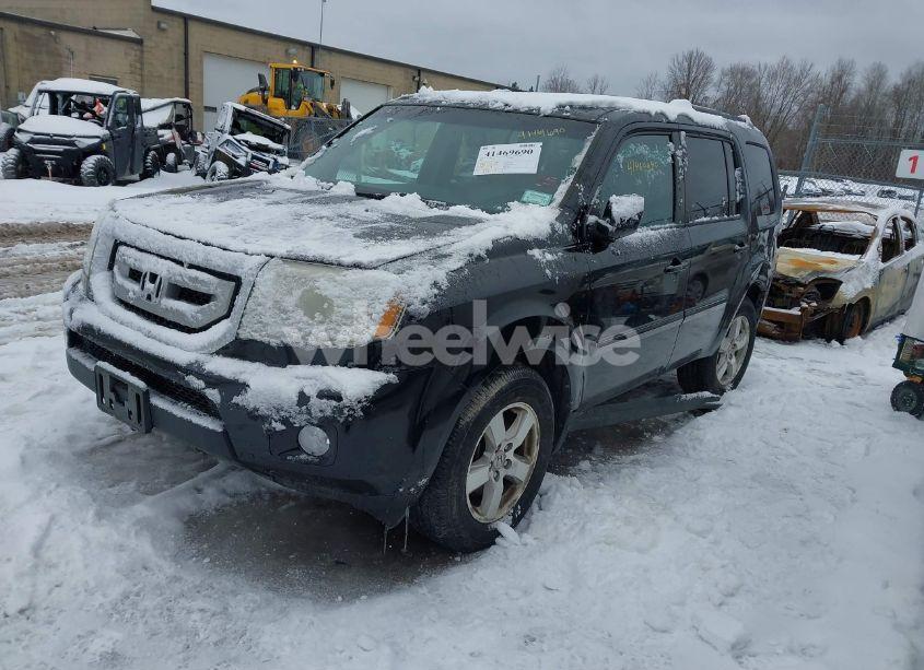 Photo 2 of 2011 Honda Pilot EX-L (VIN 5FNYF4H56BB083088)