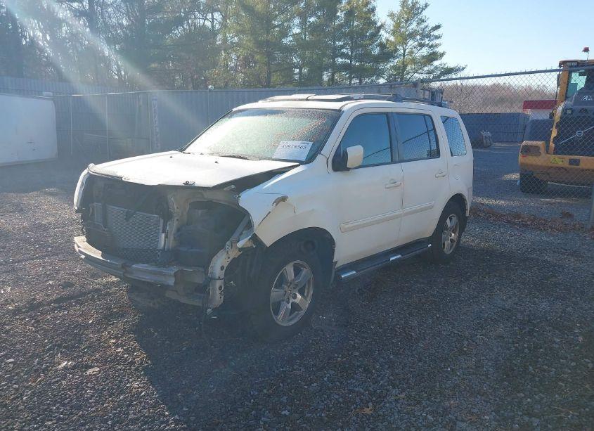 Photo 2 of 2010 Honda Pilot EX-L (VIN 5FNYF4H57AB004462)