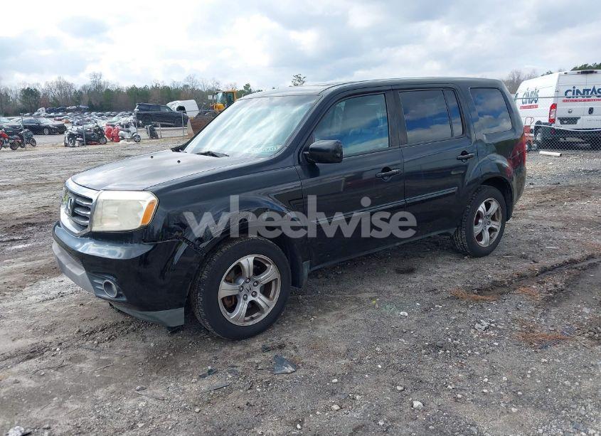 Photo 2 of 2012 Honda Pilot EX-L (VIN 5FNYF4H57CB007669)