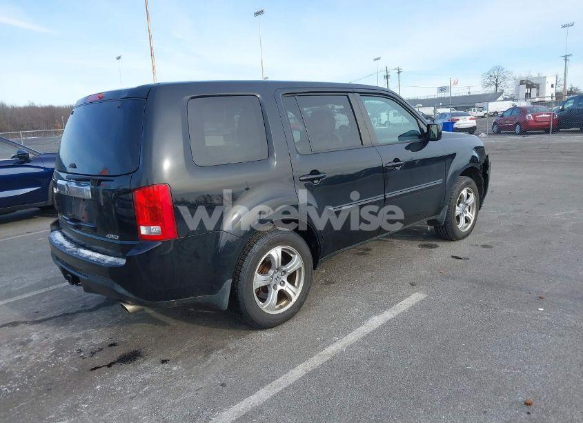 Photo 4 of 2013 Honda Pilot (VIN 5FNYF4H57DB011514)