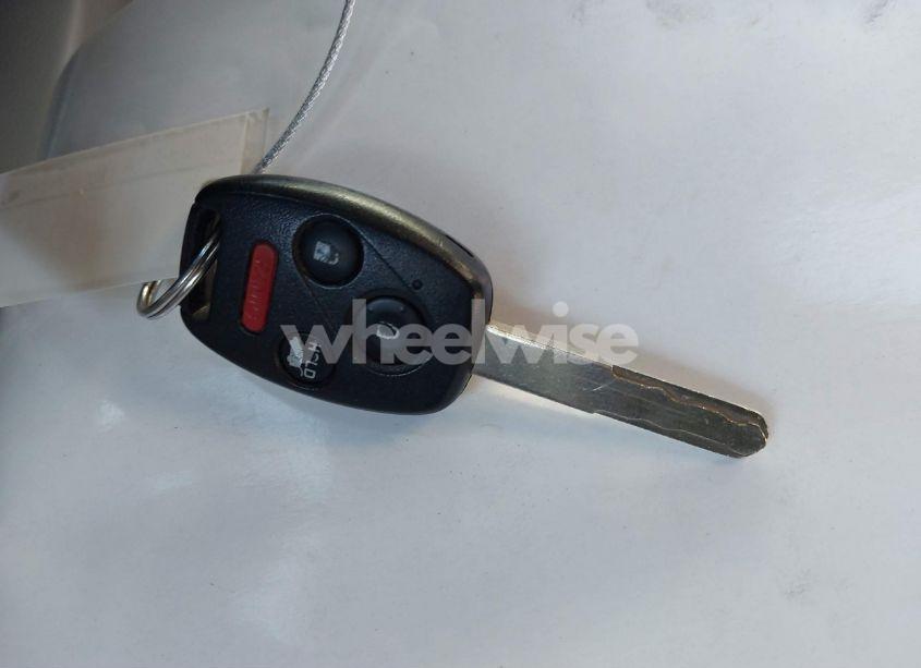 Photo 11 of 2012 Honda Pilot EX-L (VIN 5FNYF4H58CB044682)