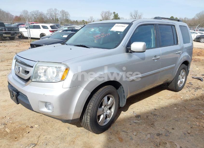 Photo 2 of 2010 Honda Pilot EX-L (VIN 5FNYF4H59AB029735)