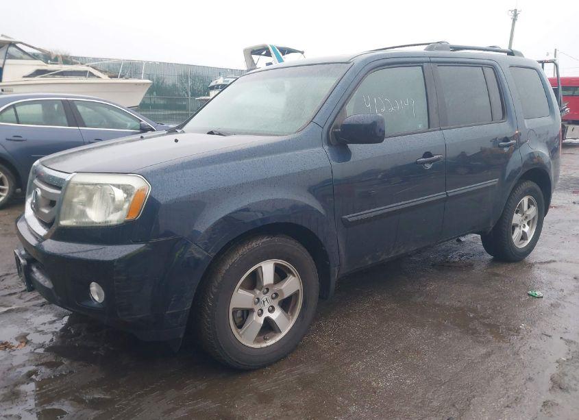 Photo 2 of 2011 Honda Pilot EX-L (VIN 5FNYF4H59BB030725)