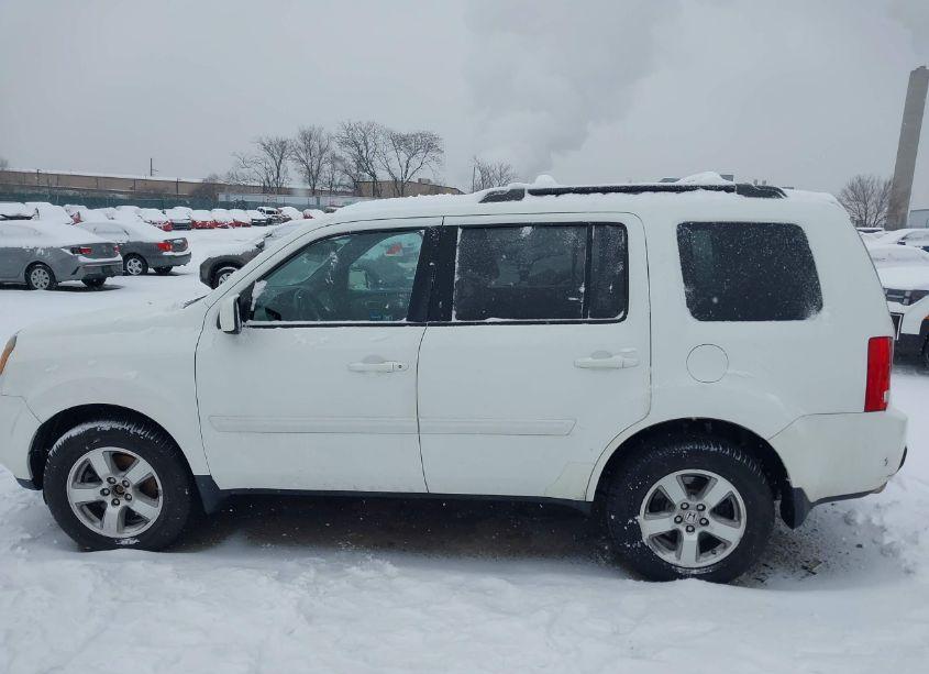 Photo 14 of 2011 Honda Pilot EX-L (VIN 5FNYF4H5XBB026635)